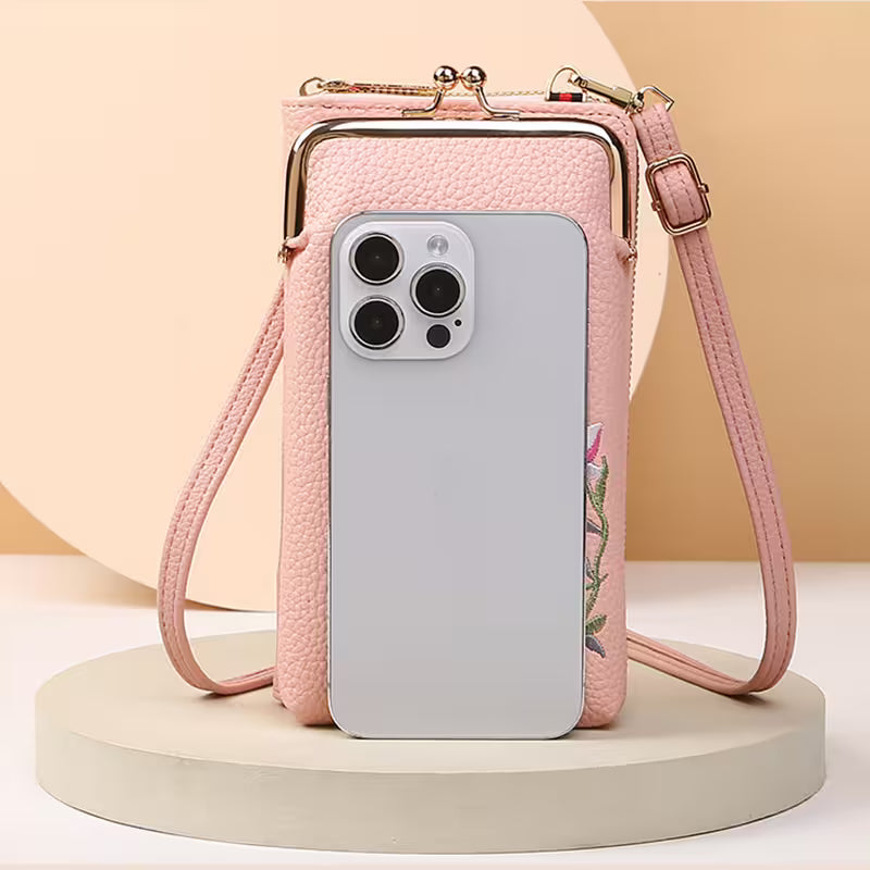 Pink phone case with a strap on a beige background