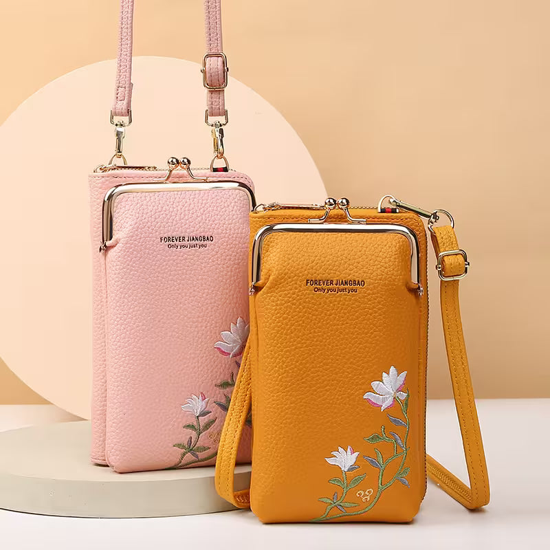 Pink and yellow handbags with floral embroidery on a beige background