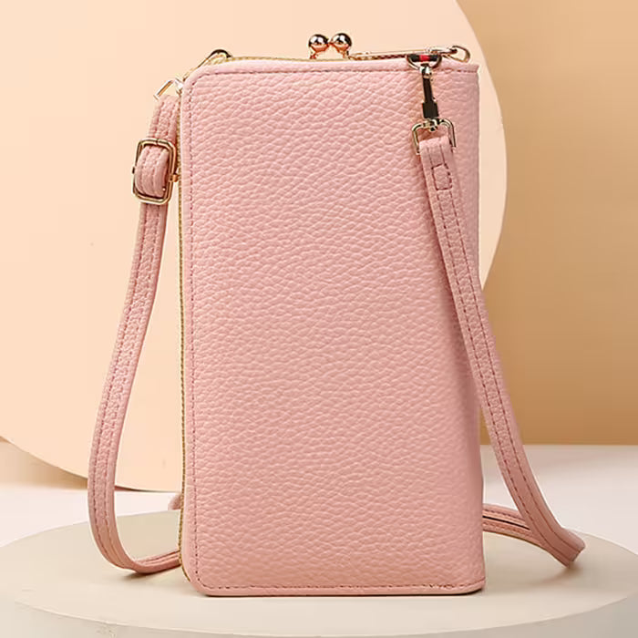 Pink textured crossbody bag on a beige background