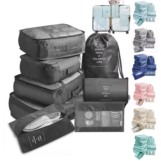 Collection of gray packing cubes and bags with text on a white background