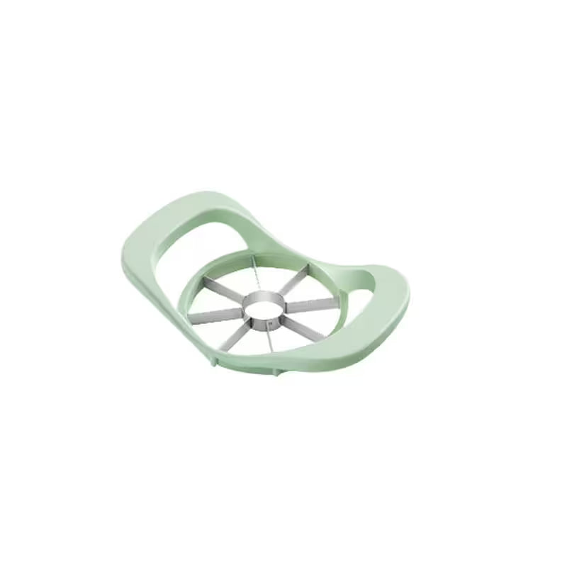 Green apple peeler on a white background