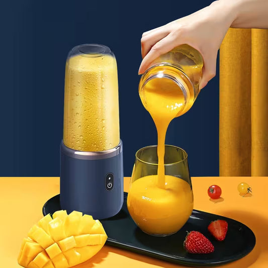 Hand pouring orange juice from a blender into a glass on a yellow surface with fruits.