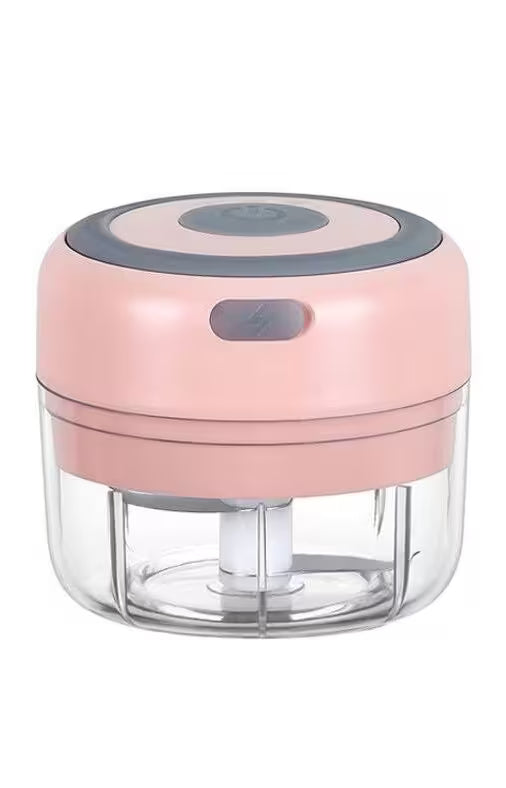 Pink and clear kitchen chopper on a white background