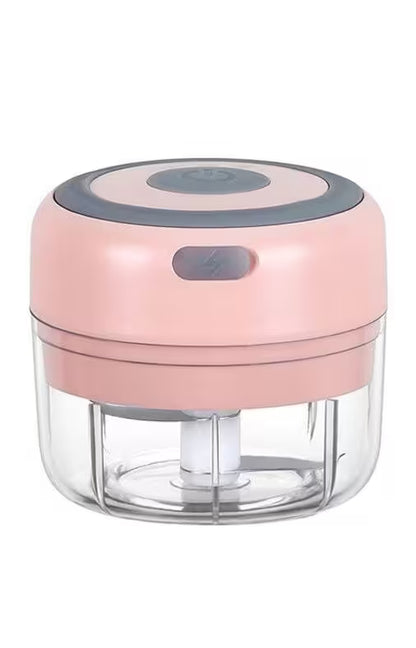 Pink and clear kitchen chopper on a white background