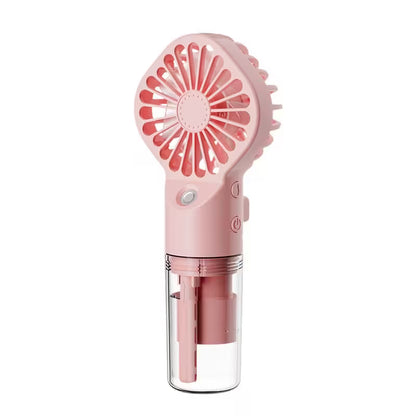 Pink handheld fan with clear base on a white background