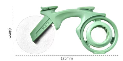 Green plastic tool with measurements on a white background
