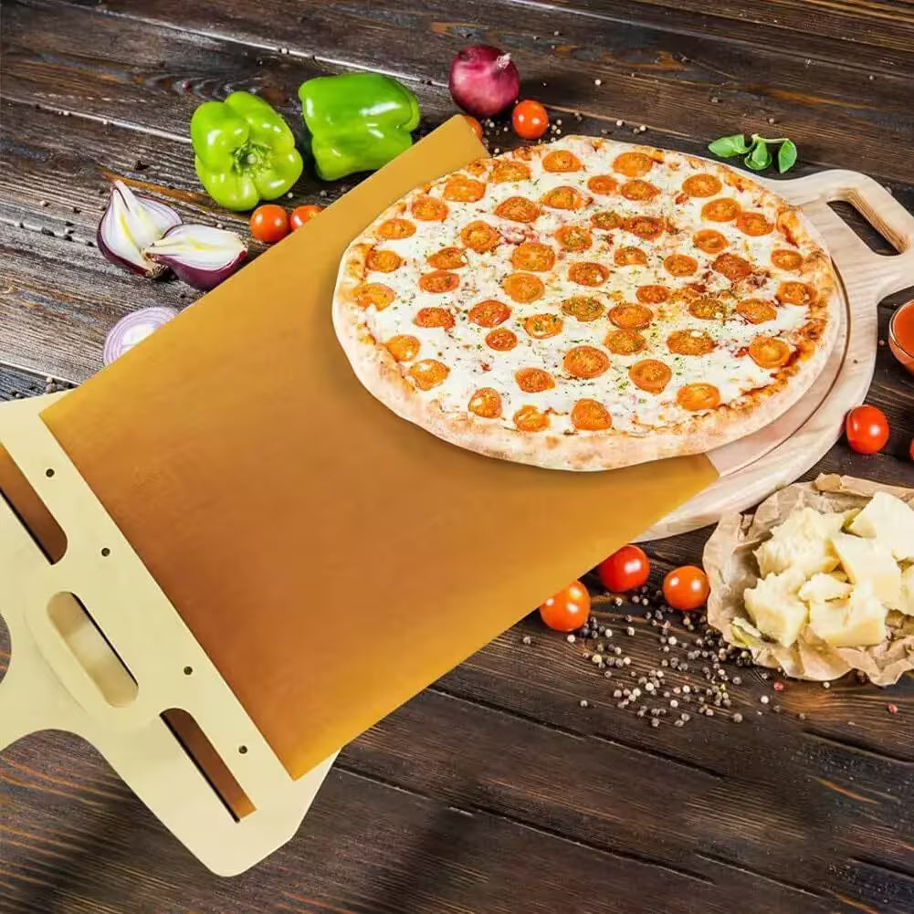 Pizza on a wooden board with various ingredients on a rustic wooden table