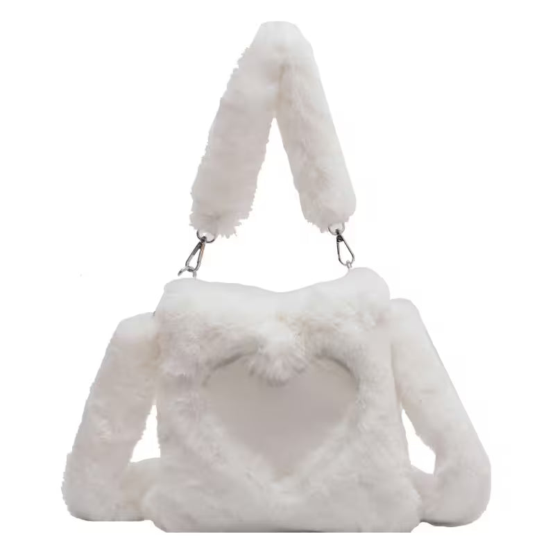 White fluffy handbag with matching handle on a white background