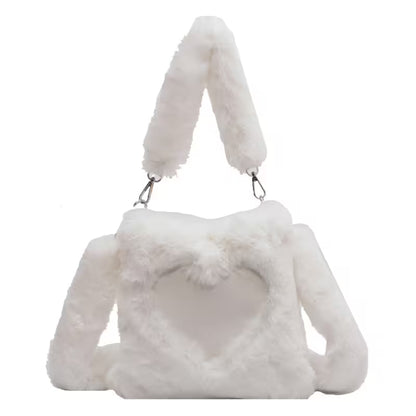 White fluffy handbag with matching handle on a white background