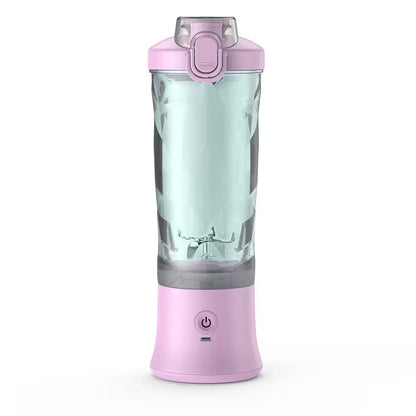 Pink portable blender with a clear container on a white background
