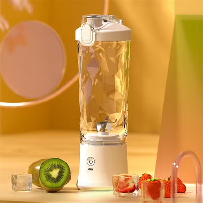 Portable blender with ingredients on a warm-toned background