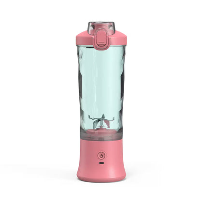 Pink portable blender with clear container on a white background