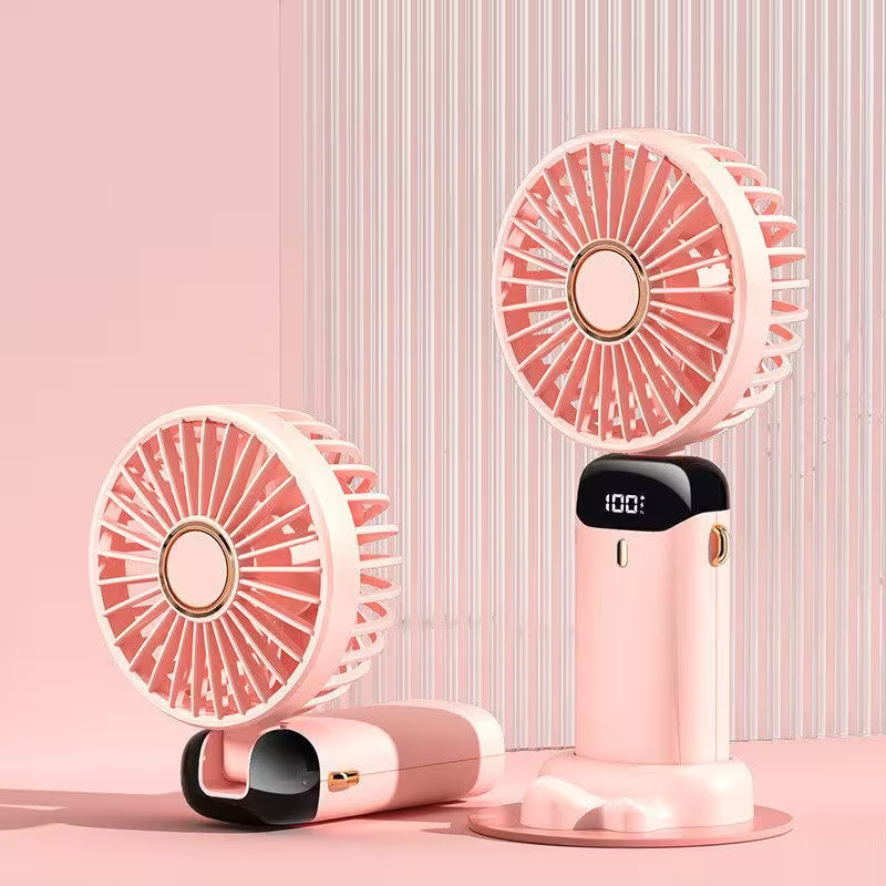 Pink handheld fans on a pink background