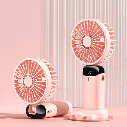Pink handheld fans on a pink background
