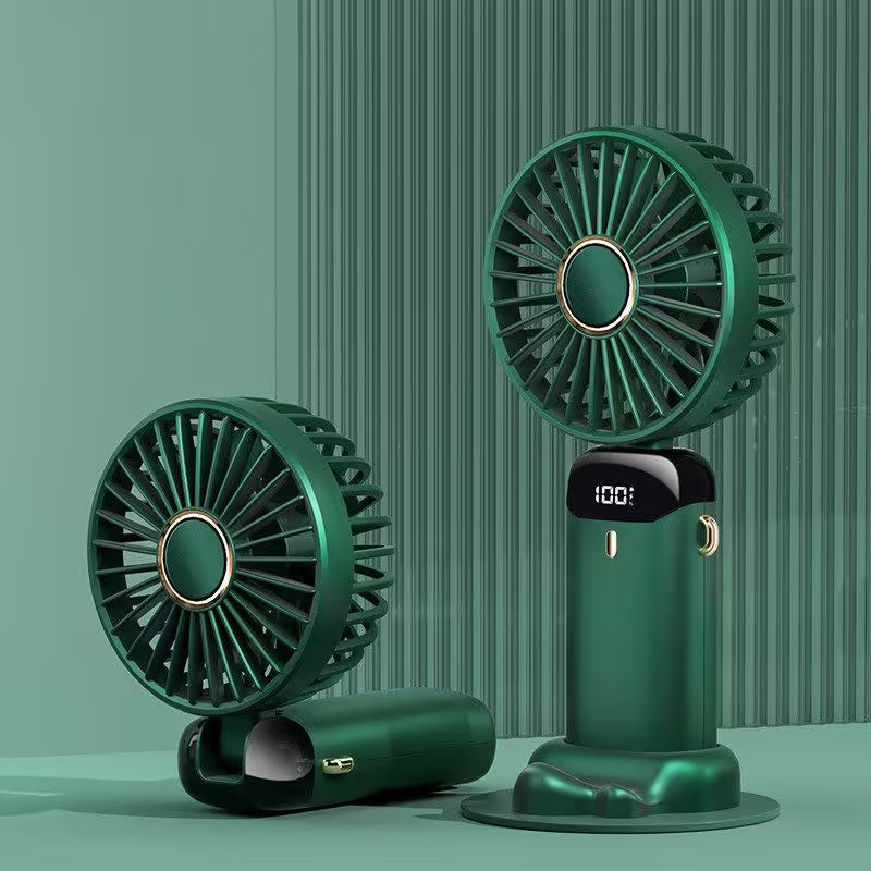 Green portable fan on a green background