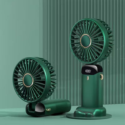 Green portable fan on a green background