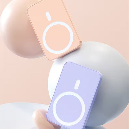 Two rectangular devices with circular designs on a soft pink background