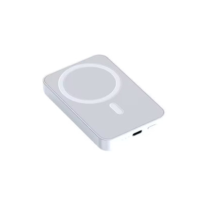 White wireless charging pad on a white background