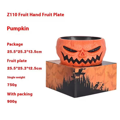 Pumpkin-shaped fruit plate with packaging on a white background
