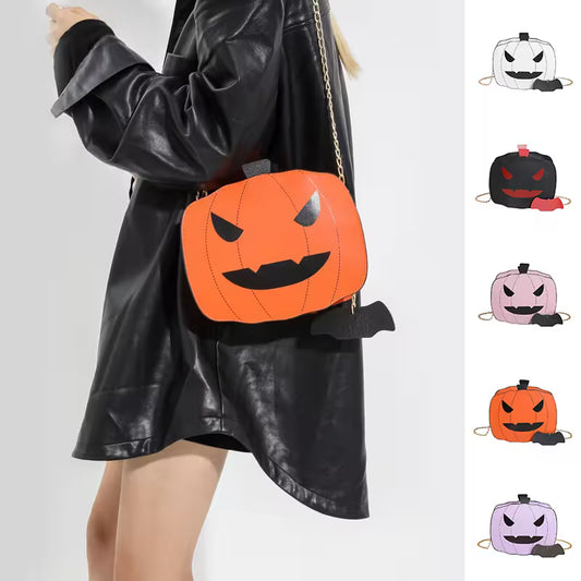 Person wearing a black leather coat with an orange pumpkin-shaped bag, surrounded by similar bags in different colors.