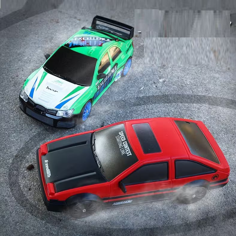 Two remote control cars, one green and white, one red and black, on a concrete surface.
