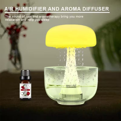 Yellow mushroom-shaped air humidifier and aroma diffuser with a bottle of essential oil on a wooden surface.
