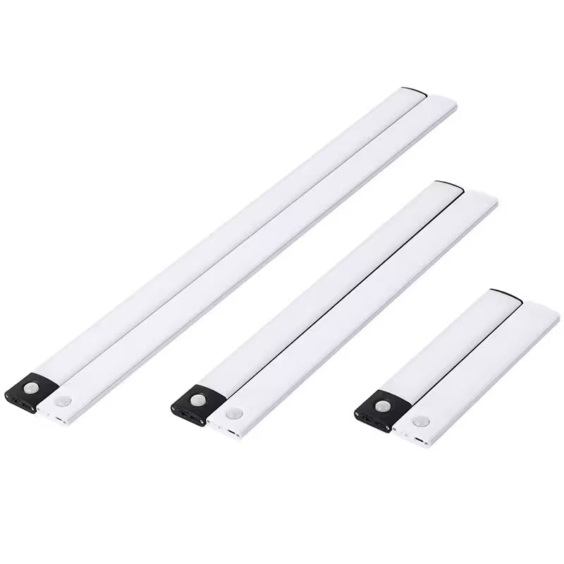 Three white LED light strips with motion sensors on a white background