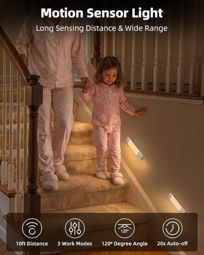 Child and adult walking up a staircase with motion sensor lights on, highlighting features like long sensing distance and wide range.