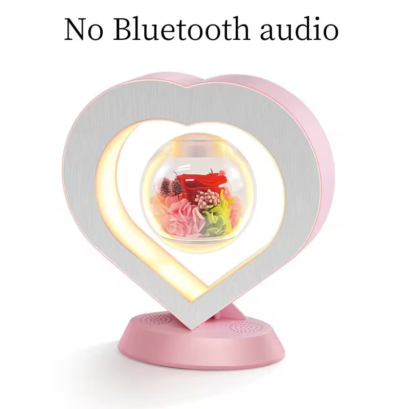 Heart-shaped lamp with Bluetooth audio feature on a white background