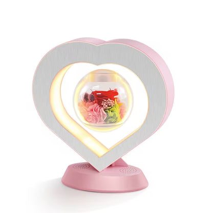 Heart-shaped lamp with a glowing interior on a white background
