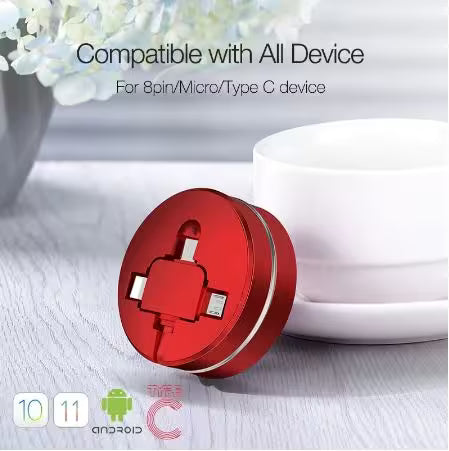 Red multi-device charging adapter on a light surface with text indicating compatibility.