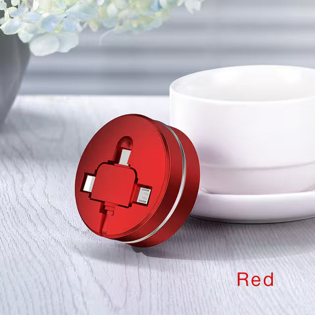 Red plug on a white surface with a white bowl and flowers in the background