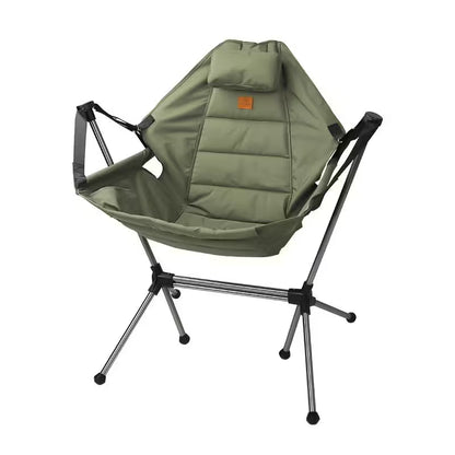 Green camping chair with a pillow on a white background