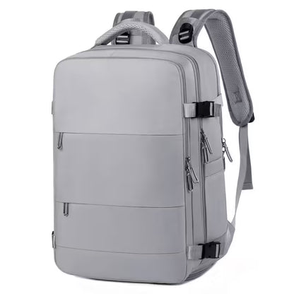 Gray backpack with multiple zippers on a white background