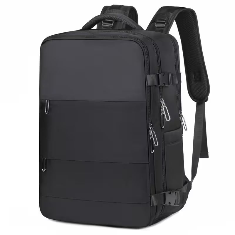 Black backpack with multiple pockets and straps on a white background