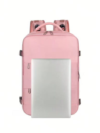 Pink backpack with a laptop compartment on a white background