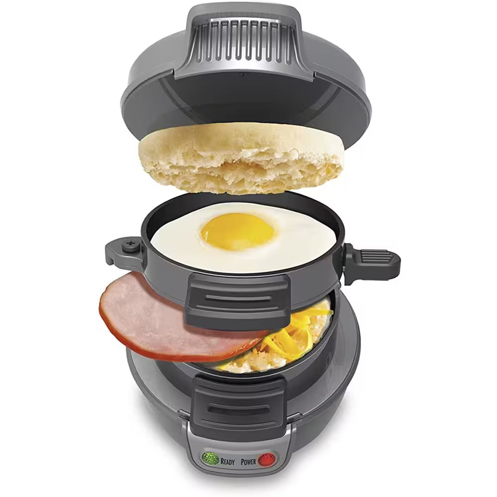 Breakfast sandwich maker with ingredients inside on a white background