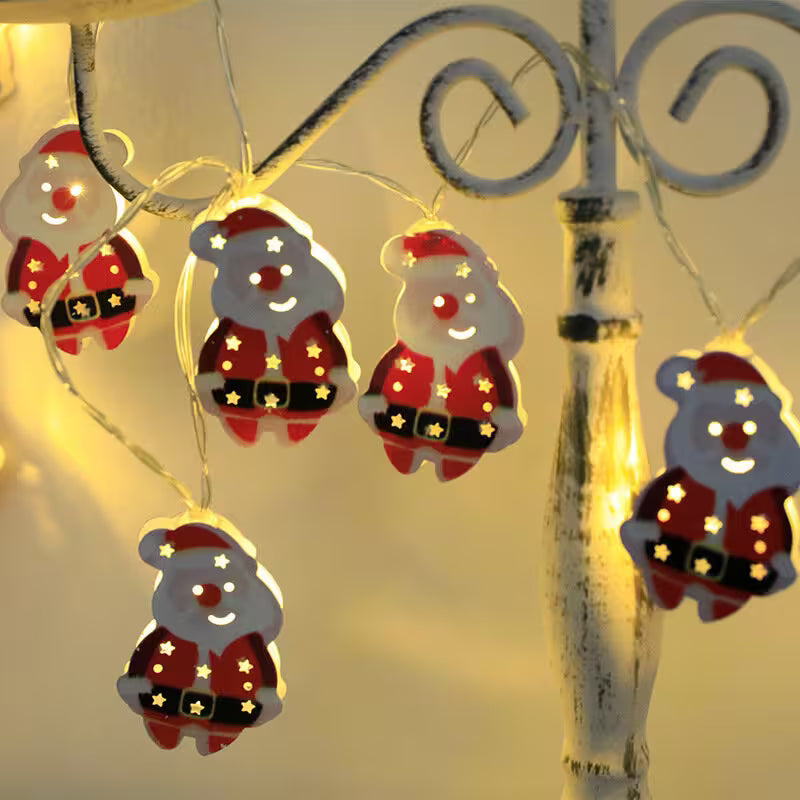 String of LED lights shaped like Santa Claus figures on a decorative metal stand.