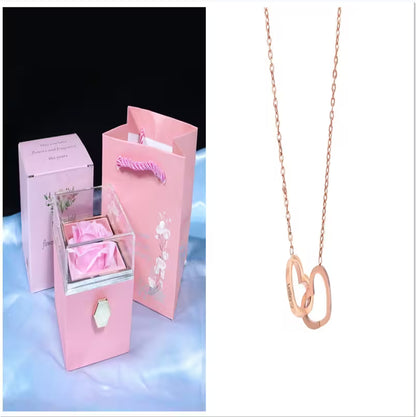 Rose gold necklace in a pink gift box with a clear lid