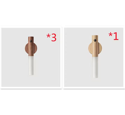 Two wooden and white cylindrical objects with quantity indicators on a white background