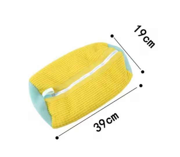 Yellow and light blue sponge with measurements on a white background