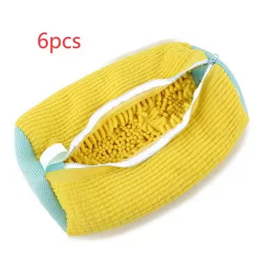 Yellow textured headband with light blue interior on a white background