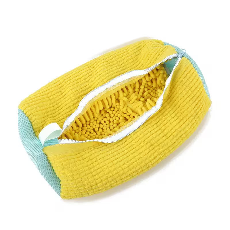 Yellow textured pouch with a white interior on a white background