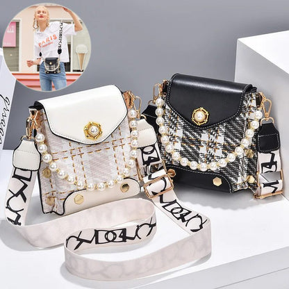 Two handbags, one white and one black, with decorative straps on a light gray background.