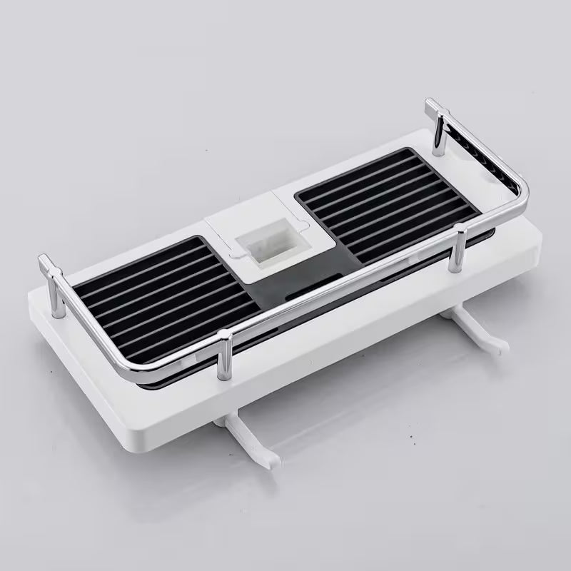 White and black kitchen utensil holder on a light gray background