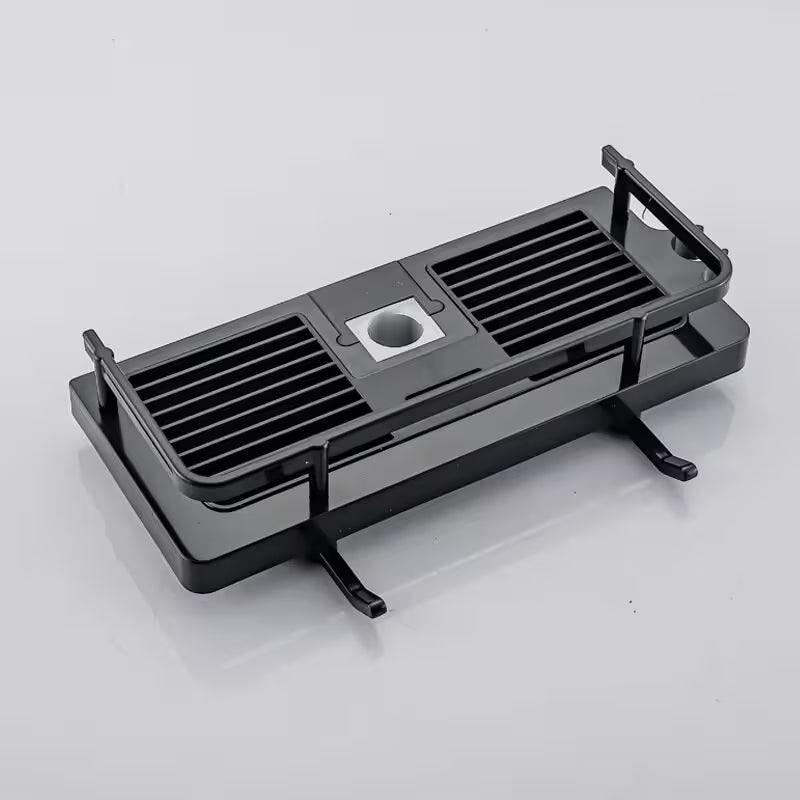 Black metal grill on a white background
