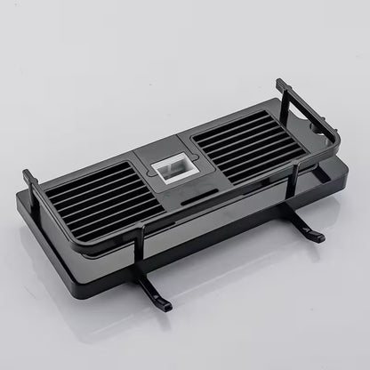 Black metal grill on a white background