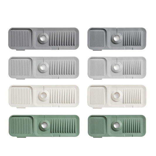 Set of eight rectangular kitchen sink cutouts in various colors on a white background