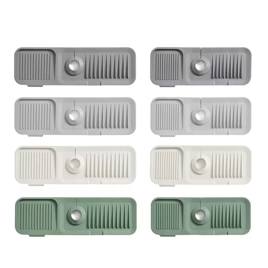 Set of eight rectangular plastic components in gray, white, and green on a white background