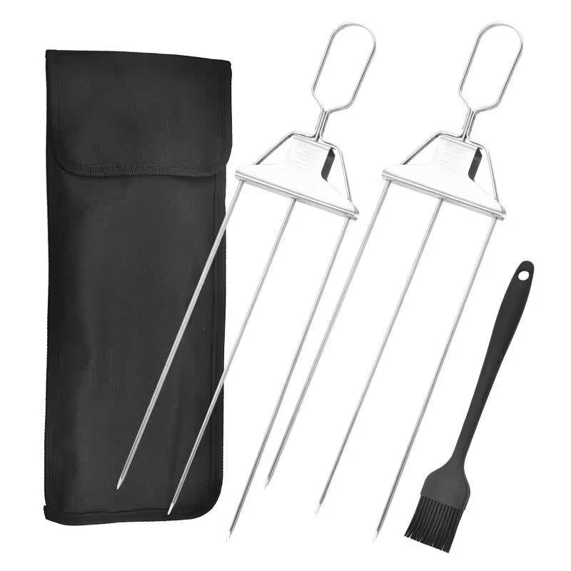 Two metal skewers with a black carrying case and a black brush on a white background